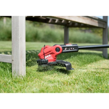 SKIL 20V trimmer 0230AA 25cm incl. 2,0Ah accu + snellader SKIL 20V Trimmer 0230AA 25cm Incl. 2,0Ah Accu + Snellader -Buiten Tuin 123 3942